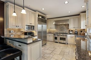 upscale kitchen in luxury home with breakfast bar